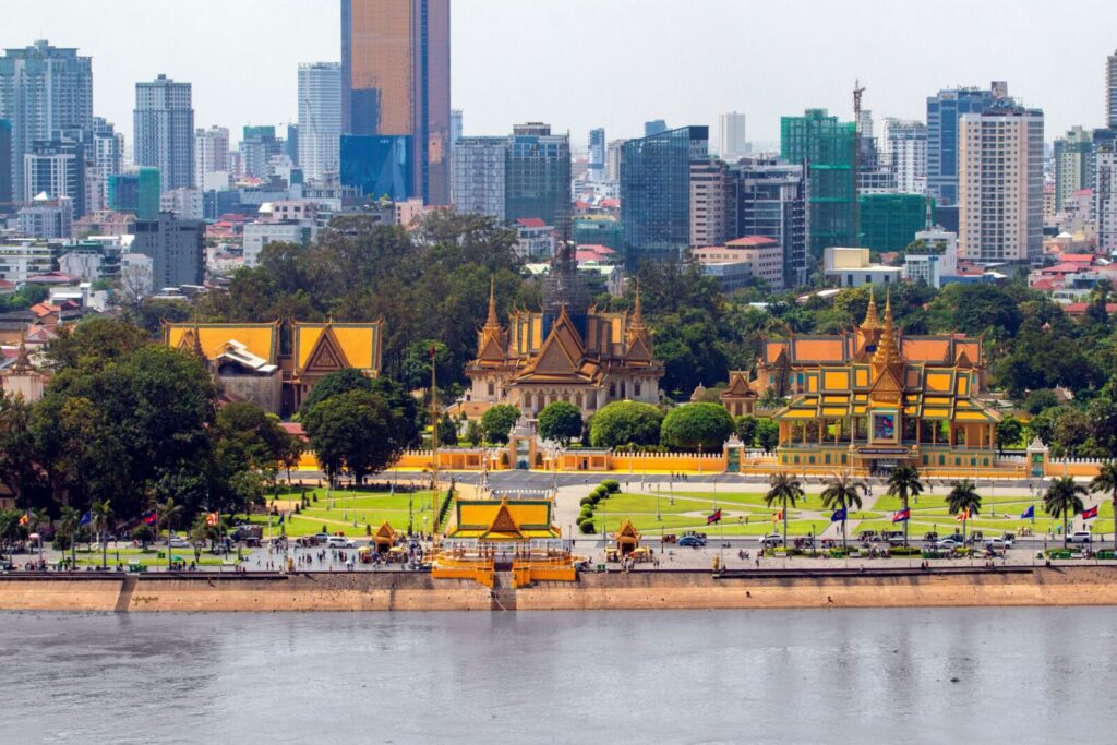 A captivating view of Phnom Penh skyline featuring the Royal Palace and modern architecture.